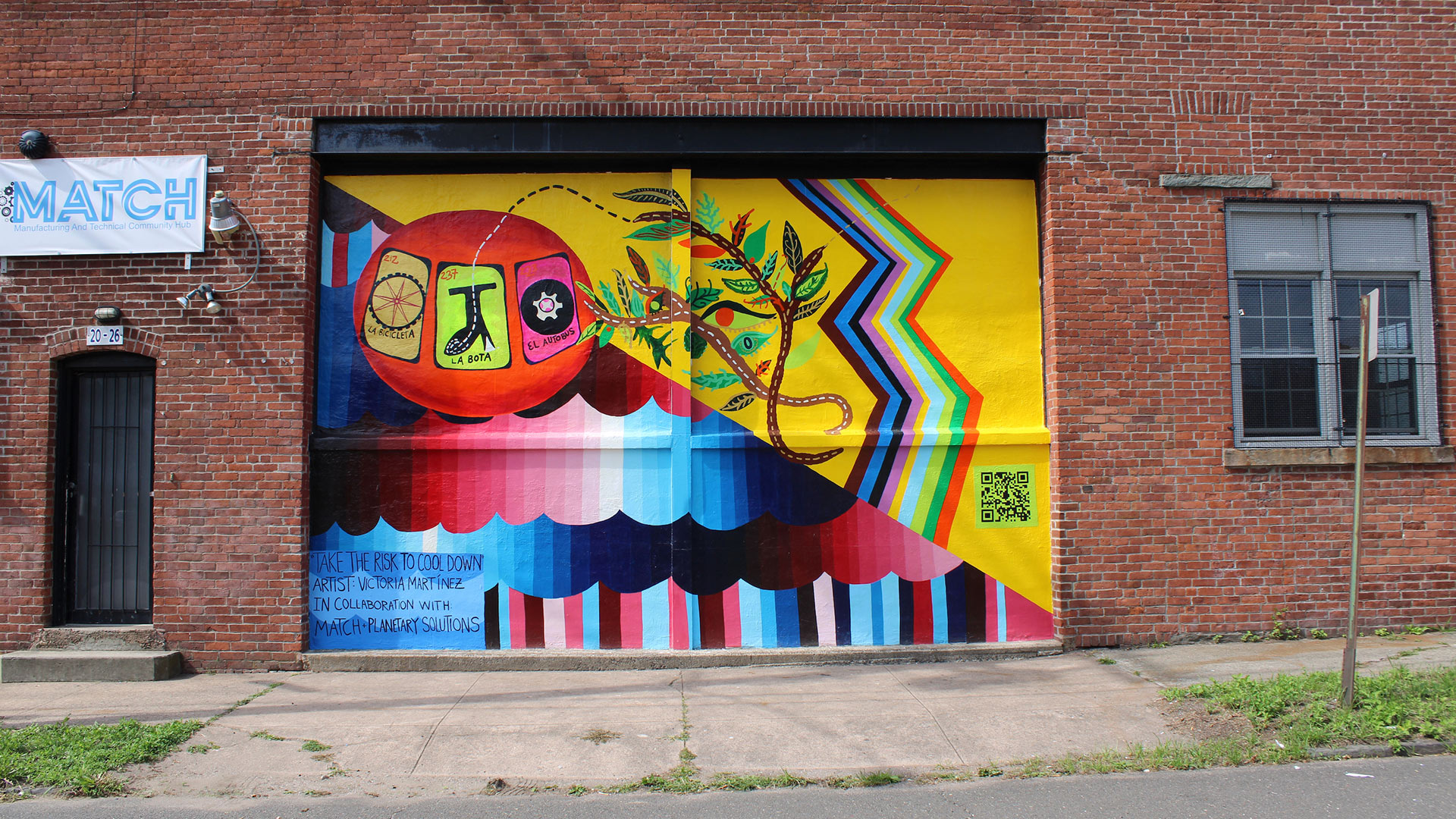 Photo of a bright colored mural named Take the Risk to Cool Down.